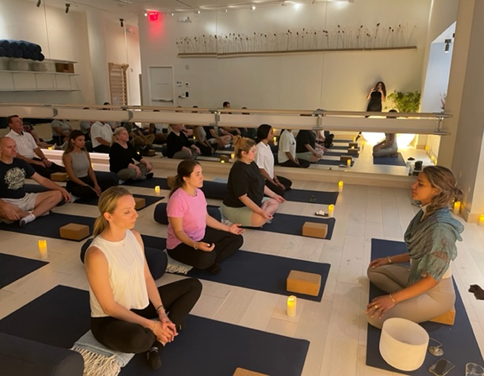 Corporate wellness programs by Aeterna Wellbeing — breathwork and yoga for teams